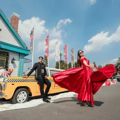 Our red satin A-line gown has a beautiful flow and movement, perfect for creating dynamic shots. It's a classic and elegant choice for a variety of photoshoot themes.