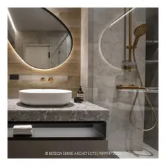 A modern bathroom combining a variety of textures. It features a stone-topped vanity with a vessel sink, a backlit oval mirror, and warm gold fixtures that add a touch of elegance.