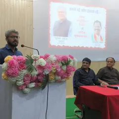 Speaking at a podium during a World Cartoonist Day event in Chhattisgarh. It was an honor to address fellow artists and art lovers, sharing my thoughts on the importance of cartooning as a medium for expression and joy.