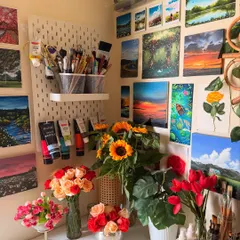Good things take time. A corner of my studio filled with fresh flowers and my paintings. The bright colors always make me feel inspired.
