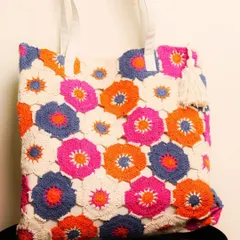 I wanted to show you a close-up of the detailed crochet work. Each hexagon is handmade by me using high-quality cotton thread. The finishing and the bright colors are what make this bag special.