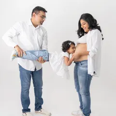 A kiss for the baby brother or sister on the way. I love capturing these unscripted moments of connection. Including older siblings in maternity shoots makes the story complete and turns the session into a beautiful family memory before the new arrival.