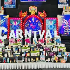 The main stage of a grand Carnival themed event we managed. The setup featured large light up letters, colorful backdrops, and a fully stocked prize table to create an authentic carnival vibe.