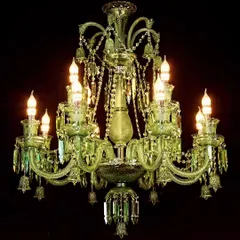 This green Italian crystal chandelier is a statement of bold luxury. The candle-style LED lights and vibrant color make it a perfect centerpiece for a living room that embraces classic design with a twist.