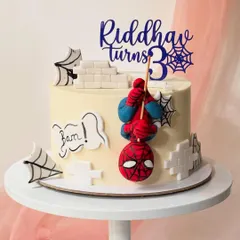Your friendly neighbourhood Spider-Man swings into action on this custom birthday cake. I used a smooth buttercream base and added fondant details like the brick wall, spiderwebs, and a 3D sculpted Spidey figure for a dynamic, action-packed design.