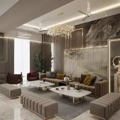 This living room is a testament to meticulous detailing. With a palette of rich browns and layered textures, we created a space that feels grand and opulent. The sculptural art and statement chandelier are curated to live in, not just to be admired.
