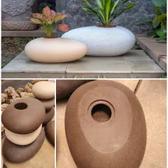 These unique pebble-shaped planters are perfect for creating a modern, minimalist garden. Their smooth, organic form looks stunning on patios or in rock gardens, and they are available in several natural tones.