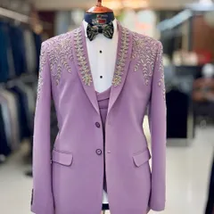 I love pushing boundaries with color. This custom lavender tuxedo, featuring delicate silver embroidery, is for the modern man who isn't afraid to stand out at a cocktail party or sangeet.