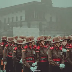 Amidst the formal lines of the parade, I look for human moments. The faint smile on this soldier's face, shared with her comrades from the Assam Rifles, adds a layer of personality and warmth to the disciplined event.