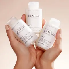 The Olaplex No.3 Hair Perfector is an essential take-home treatment. It's not a conditioner, but a bond-builder that continues the repair process at home, maintaining your hair's strength and integrity between salon visits.