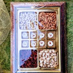 For those who love traditional gifts, we offer this Festive Mewa Gifting Tray. It's packed with premium quality dry fruits like cashews, almonds, pistachios, and raisins, along with a selection of our white chocolate bites.