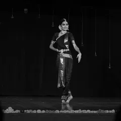 A black and white shot of my student Madhusri during her maiden Arangetram. This image captures the poise and confidence she exuded on stage.