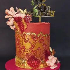 Another angle of the illuminated 25th anniversary cake. The combination of the bold colors, intricate stenciling, and the warm glow makes this a true showstopper for a silver jubilee.
