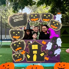 Halloween is a family affair here. I love seeing the whole family get into the spirit, dressing up and posing together in our spooky-fun photo booth.