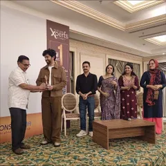 Receiving recognition from my peers after my talk on peptides. Engaging with other dermatologists is essential for sharing knowledge and ensuring we all provide the best, most current care to our patients.