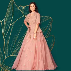 This indo-western lehenga with a tie-front jacket is one of my favorite styles. It's perfect for a guest who wants to look stylish and unique at a wedding.