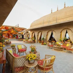 A Haldi ceremony themed 'Turmeric & Zataar' to honor the couple's mixed cultures. The decor used warm, spicy tones and palatial elements to create a unique fusion atmosphere.