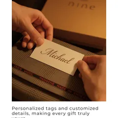 Personalization is key to making a gift memorable. Here, we are adding a custom name tag to a fabric gift set, a small detail that shows the recipient how much they are valued.