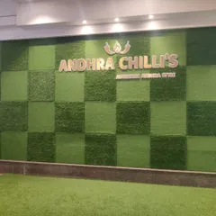 An artificial grass wall designed for the Andhra Chilli's restaurant. The checkerboard pattern using two different turf textures adds a unique, branded touch to their interior.