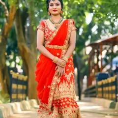 This magnificent red and gold lehenga is available to rent for your royal-themed pre-wedding shoot or reception. It is heavily embroidered for a truly grand look.