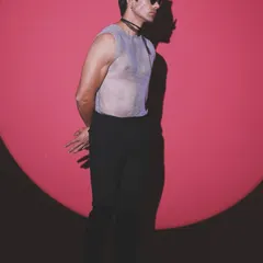 Playing with trends for a men's fashion editorial. This look features a sheer mesh top, a recurring element in modern menswear, styled for a bold and avant-garde statement.