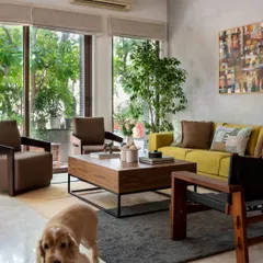 A pet-friendly and lived-in space that doesn't compromise on style. The durable rugs and accessible layout ensure that every member of the family, including the furry ones, can enjoy this beautiful room.