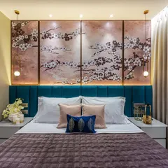 The headboard wall is a great opportunity to make a statement. In this bedroom, we used a beautiful cherry blossom wall panel behind a teal headboard to create a dramatic and artistic focal point.