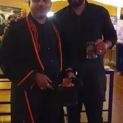 Sharing a moment with a happy guest after a performance. It’s always a pleasure to pose for a photo and chat about the magic after the show is over.