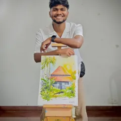 Standing proudly with the finished demonstration piece. This painting of a traditional house was created live, and it was a joy to see it come to life with the audience.