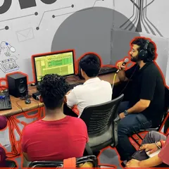 A student gets hands-on experience with vocal recording techniques during an Audio Production class. We create a safe space for learners to experiment with microphones and software to find the perfect sound.
