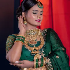 A close-up of the makeup for this green lehenga look, focusing on the flawless base and contouring.