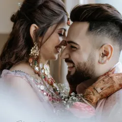 A close-up of Shaina and Lakshay, their faces close together, sharing a moment of genuine laughter. This is the kind of candid intimacy I love to capture.