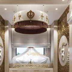 The custom-designed circular chandelier features Sikh Khanda motifs, adding another layer of spiritual symbolism and elegance to this sacred space.