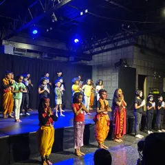The young stars of our summer workshop take a bow after a fantastic performance, their faces beaming with pride.
