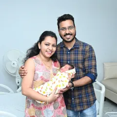 Capturing the pure joy of new parents is one of the best parts of my job. This beautiful portrait was taken right after I set up the family's welcome home celebration, a priceless memory of their first moments together.