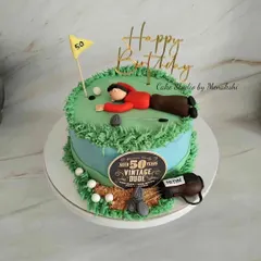 A golf themed 50th birthday cake for a 'Vintage Dude'. I had fun creating this scene of a golfer on the green, complete with a golf bag and balls.