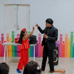 Audience participation is key to my show. This young volunteer was fantastic, helping me create a magical moment for all her friends to see. I make sure the birthday child and their friends feel like part of the act.