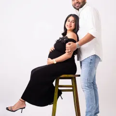 The journey is always sweeter when you walk it together. This pose captures the partnership and shared excitement of expecting parents. It’s a beautiful way to document your story as a couple before you become a family of three.
