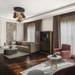 This living room showcases a variety of pieces we crafted: the L-shaped sofa, the pink armchairs, the nested coffee tables, and the bar unit. Each piece was made to the designer's specifications to create a harmonious and luxurious space.