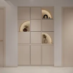 Playing with shapes and light. This custom storage unit features square cabinets with integrated curved niches, backlit to create a soft glow and highlight the decorative objects within.