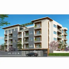 The proposed day-view elevation for VN Vista premium apartments in Bangalore. The design features a clean material palette of white, grey, and wood, with spacious balconies for each unit.