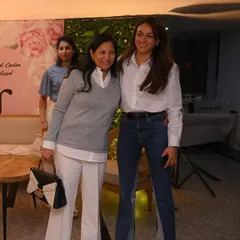 Posing with an attendee at the Udana Wellness event. It was wonderful to connect with so many people interested in yoga and preventive care.
