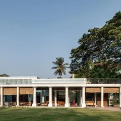 From the lawn, you can see how the colonnade respects the scale and presence of the original building. My intervention is subtle, creating a functional and beautiful space that allows the 100-year-old architecture to remain the star.