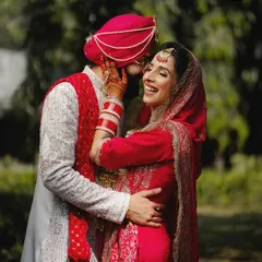 The pure joy of a wedding day. We captured this beautiful, unscripted laugh during the couple's portrait session, a memory of pure happiness.