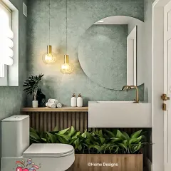 A fresh and modern bathroom design with sage green textured walls. We incorporated a planter box at the base of the vanity to bring a touch of nature indoors, complemented by gold-finish fixtures.