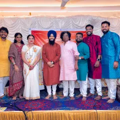 A group photo with fellow artists and organizers after the concert in Mumbai. Music is about community and shared experiences.