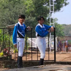 Two of our riders relaxing by the arena. The friendships made during training and competitions are one of the most rewarding parts of being on Team REA.