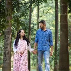 An expecting couple enjoying a walk through the woods during their maternity shoot. I love capturing the anticipation and connection between partners before their little one arrives.