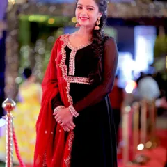 Actress Duniya Rashmi looking graceful in a black and red Anarkali at the Chittara Star Awards. I focus on capturing both the outfit and the personality.