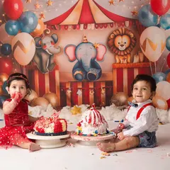 These two little darlings came to melt my heart. Turning one is so much fun, especially with a colorful carnival theme and two delicious cakes to smash.